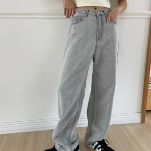 Washed-out long wide denim pants