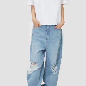 Liberty destroyed over wide denim pants